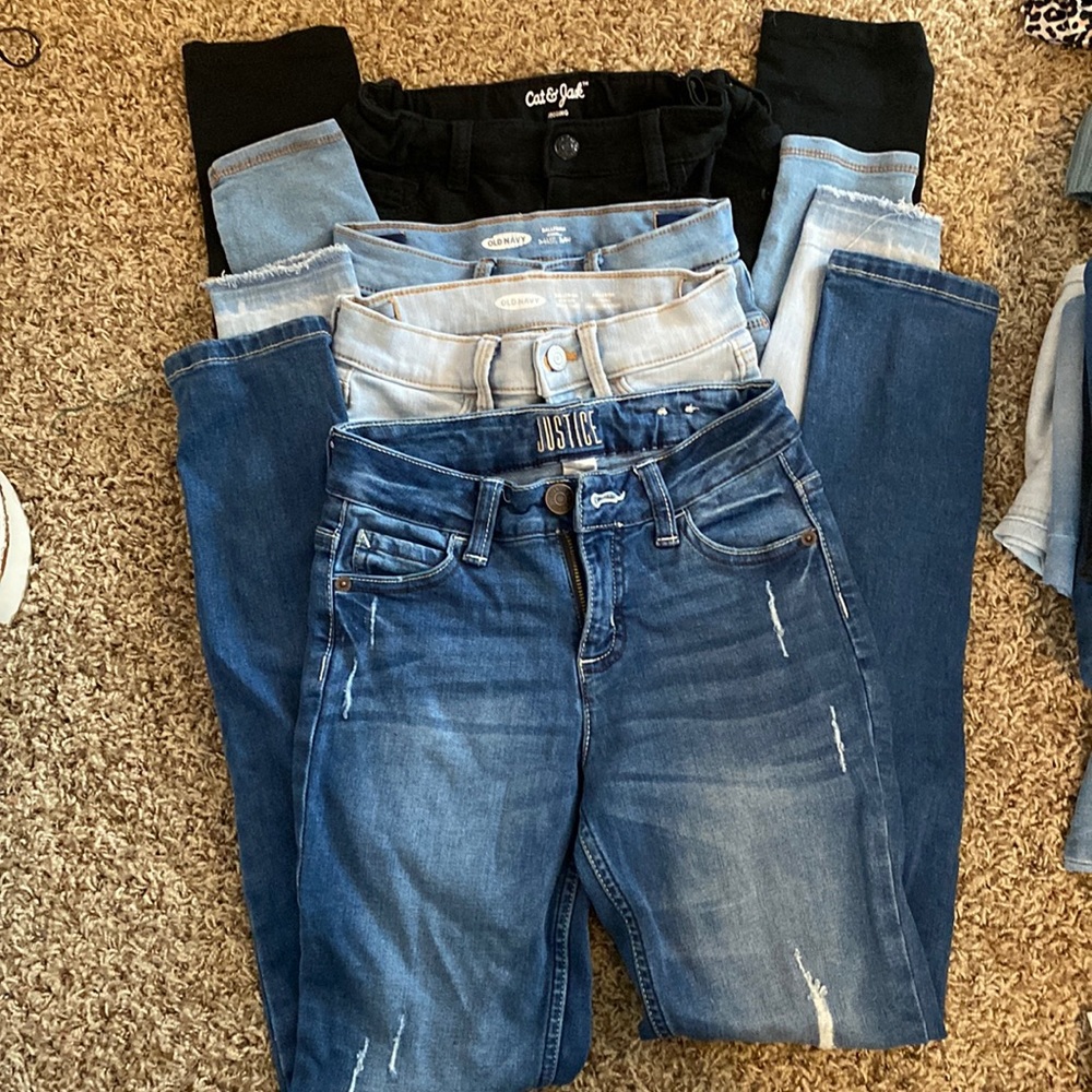 Set of four jeans/jeggings size 10/12